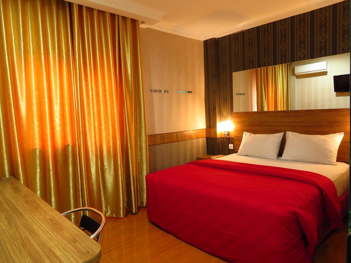 Hotel Menara Lexus Медан Экстерьер фото